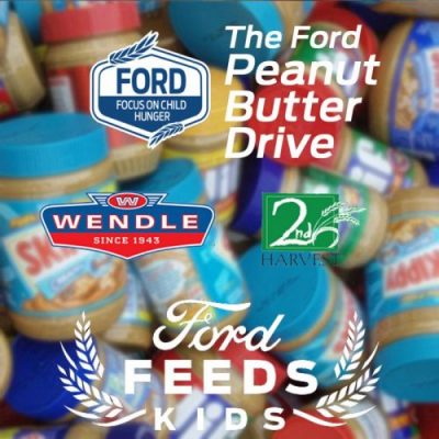 Lots of peanut butter jars with the Wendle Ford, 2nd Harvest and Ford Peanut Butter Drive logos.