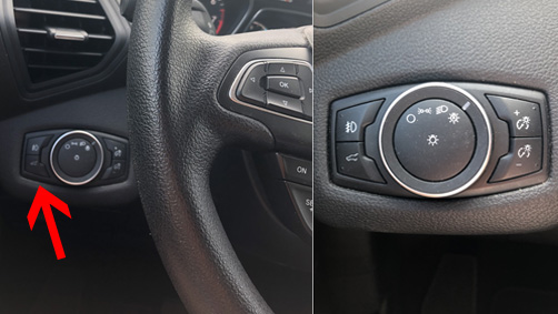 the button to open the hatch of the ford escape is located left of the steering wheel