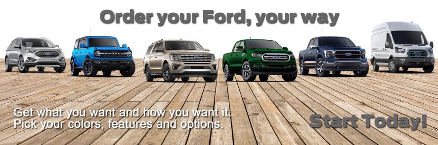 A lineup of Ford models on wooden planks-silver Edge, blue Bronco Sport, gold Expedition, green Ranger, dark blue F-150 and white E-Transit.