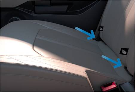 A vehicle seat with arrows pointing to the latches for securing a child car seat.